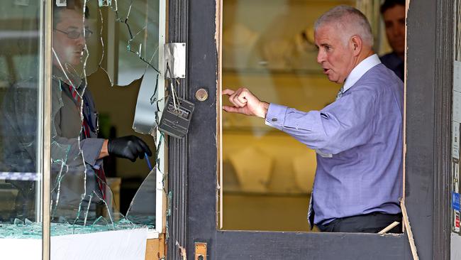 Police collect evidence from scene of a robbery at Holloway Diamonds, Camberwell. Picture: Tim Carrafa