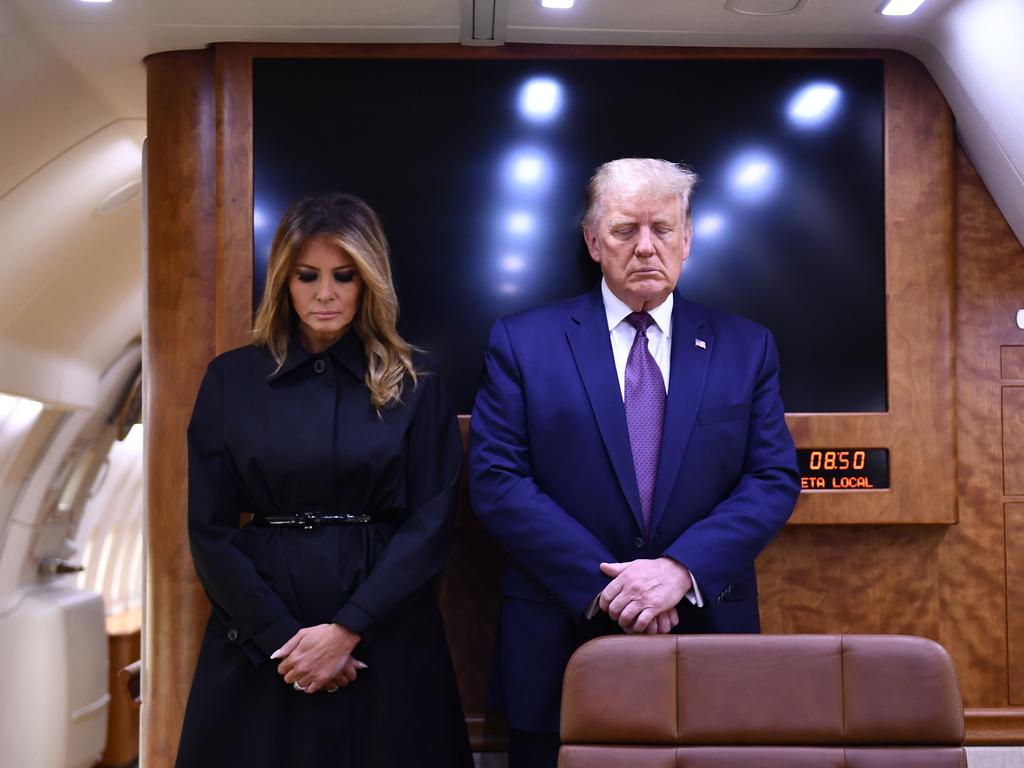 US President Donald Trump and First Lady Melania Trump observe a moment of silence aboard air force One to mark the 9/11 attacks on September 11, 2020. Picture: Brendan Smialowski / AFP.