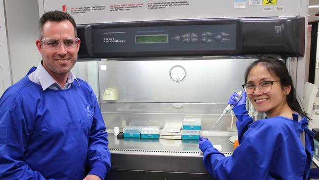 SA Water senior manager of water expertise and research, Dr Daniel Hoefel, with SA Water scientist in environmental microbiology, Melody Lau, doing COVID-19 wastewater testing.