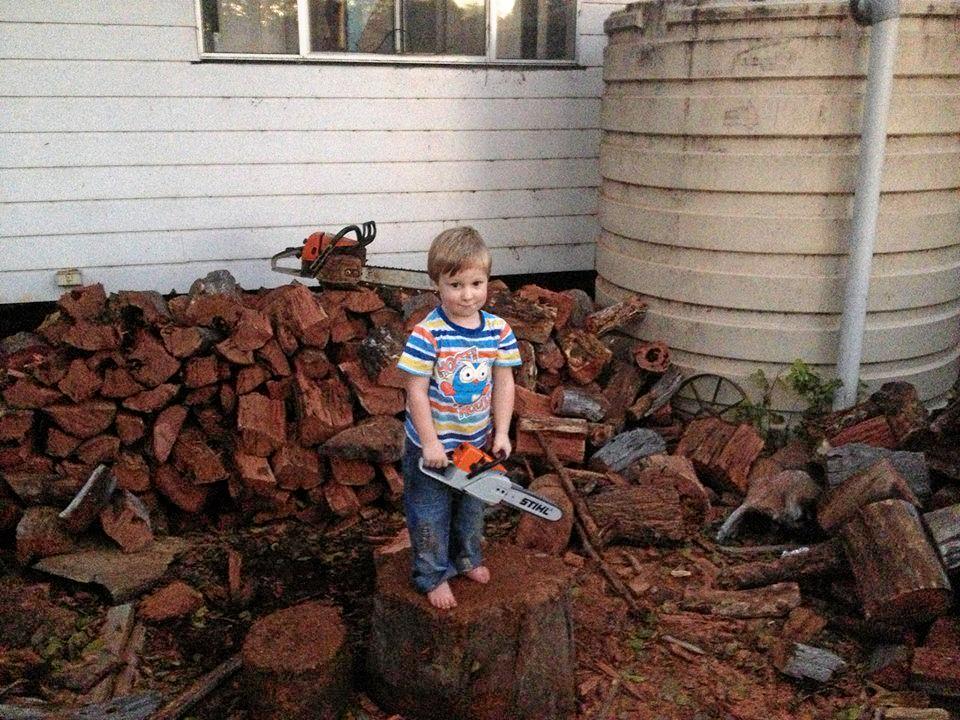 HARD YAKKA: Unlike dad, Isaac Gale can get through a stack of wood without causing any long-term injuries. Picture: Andrew Gale