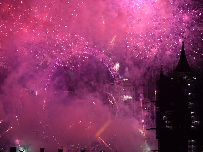 Fireworks explode over The Coca-Cola London Eye, Westminster Abbey and Elizabeth Tower near Parliament. Picture: Getty