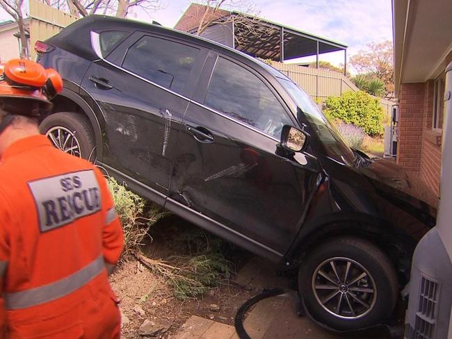 Driver ploughs through fence and down embankment September 2022. Picture: 7NEWS