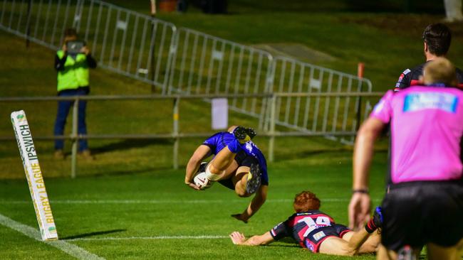 Goodna back Bessie Aufaga-Toomaga crosses for a spectacular try to secure a memorable 38-18 victory over Valleys in the opening round of the Volunteers Cup competition. Picture: Bruce Clayton