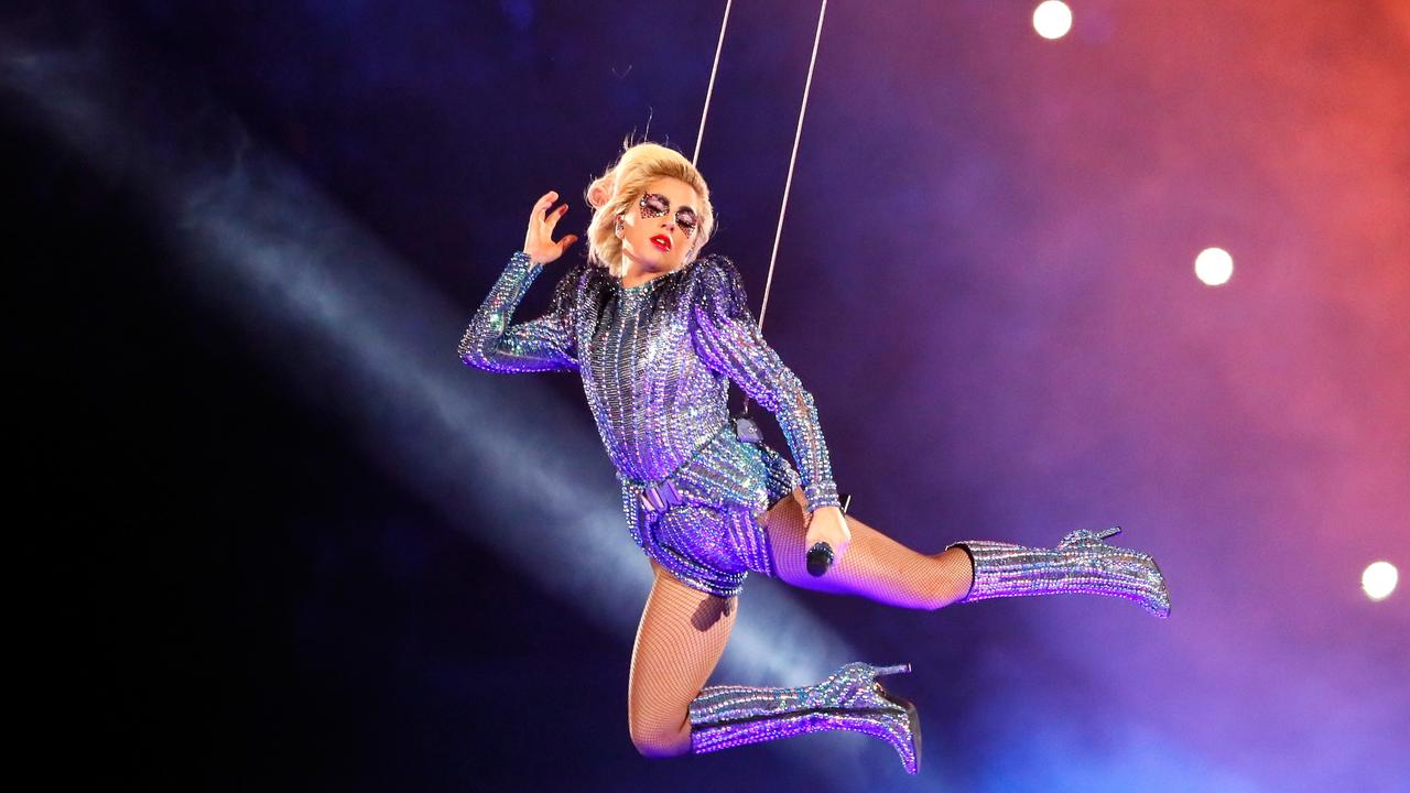 2017: Lady Gaga shocked fans as she performed while suspended above the stadium in Houston, Texas. Picture: Patrick Smith/Getty Images