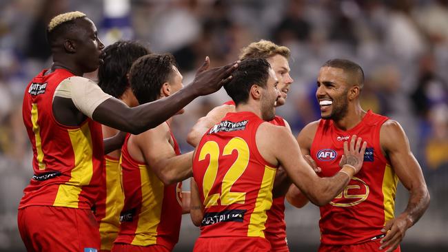 Gold Coast coach Stuart Dew says his players have reached a point where they now believe they can win every week. Picture: Getty Images