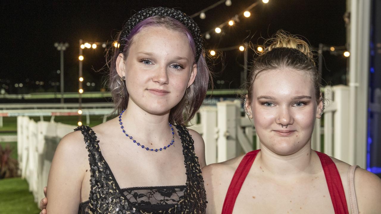 Ava Mills and Ella Fallon. New Year's eve at King of the Mountain race day, Clifford Park race course. Saturday, December 31, 2022. Picture: Nev Madsen.