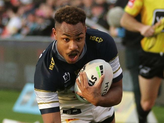 PENRITH, AUSTRALIA - JULY 19: Hamiso Tabuai-Fidow of the Cowboys scores a try during the round 10 NRL match between the Penrith Panthers and the North Queensland Cowboys at Panthers Stadium on July 19, 2020 in Penrith, Australia. (Photo by Matt King/Getty Images)