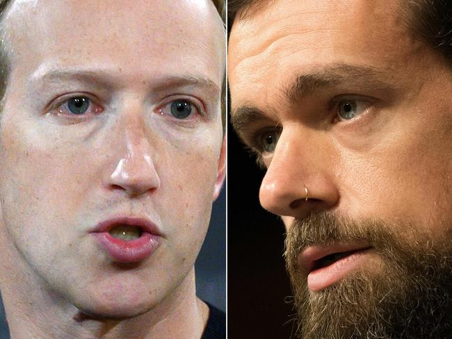 Zuckerberg (left) and Dorsey. Pictures: AFP