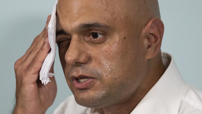 Former British health secretary Sajid Javid mops his brow while launching his bid to be the next Conservative Party leader on Monday in London. Picture: Getty Images