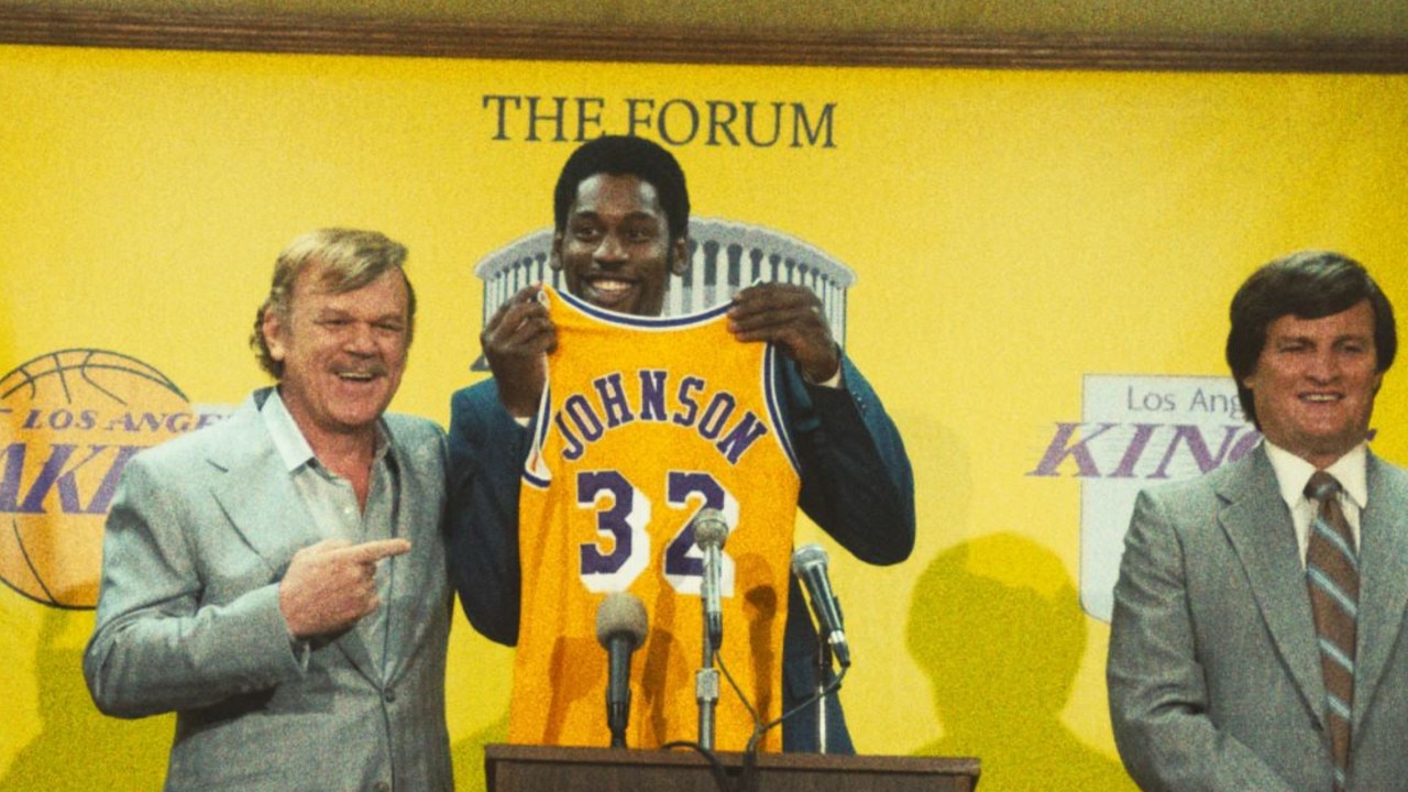 John C. Reilly (left) and Quincy Isaiah (middle) as Jerry Buss and Magic Johnson in <i>Winning Time</i>.