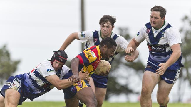 Brothers players (from left) Matt Eising, Mitch Revell and Izahia McLeod tackle Mamakumai Maiyep of Western Mustangs against Brothers in a pre-season trial rugby league match at Glenholme Park, Sunday, February 23, 2020. Picture: Kevin Farmer