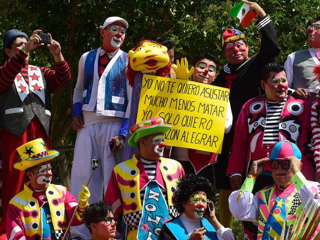 <!DOCTYPE html PUBLIC "-//W3C//DTD HTML 4.0 Transitional//EN" "http://www.w3.org/TR/REC-html40/loose.dtd"><html><body><p>Clowns pose during the family photo at the XXI Convention of Clowns, at the Jimenez Rueda Theatre, in Mexico City on October 19, 2016. Picture: AFP PHOTO / Alfredo ESTRELLA</p></body></html>