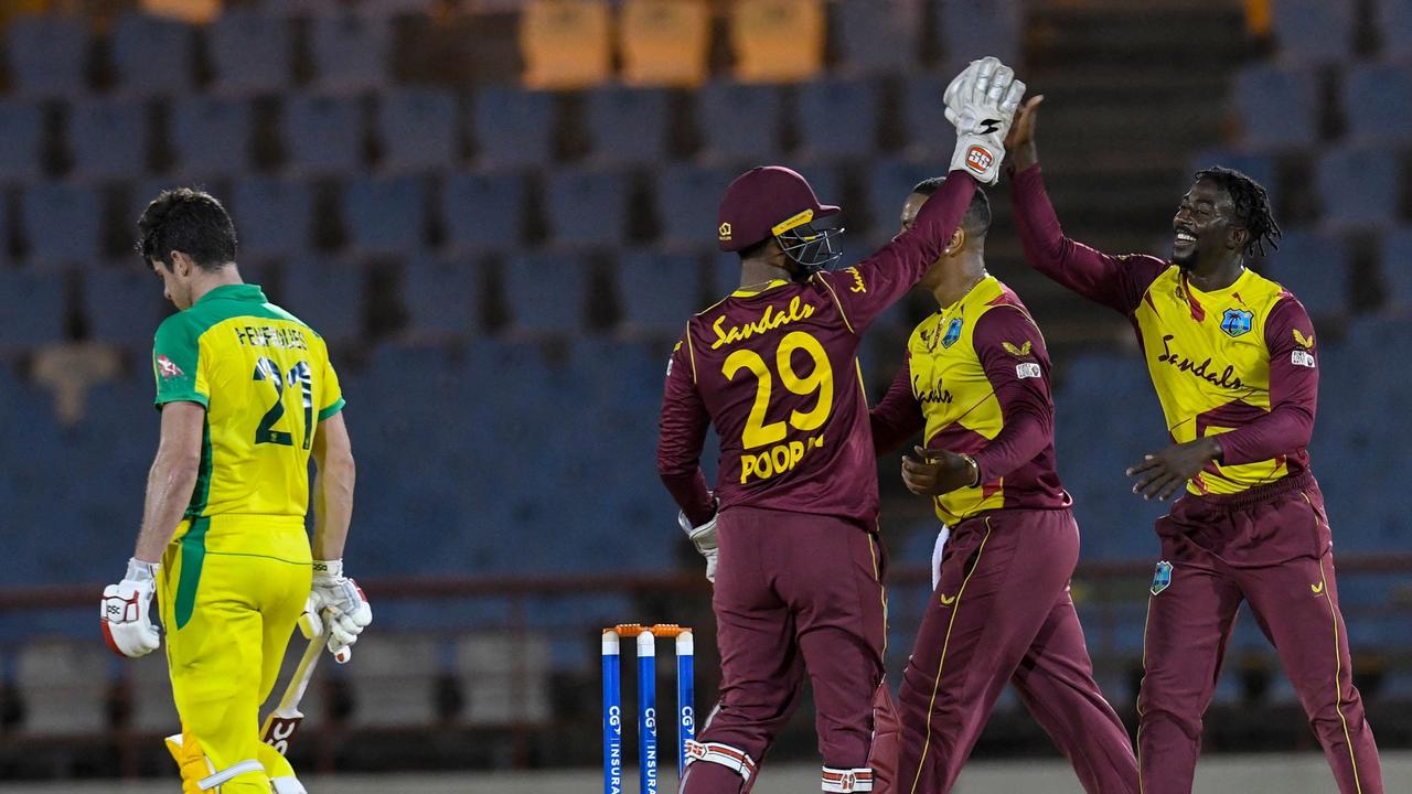 West Indies celebrate the key dismissal of Moises Henriques.