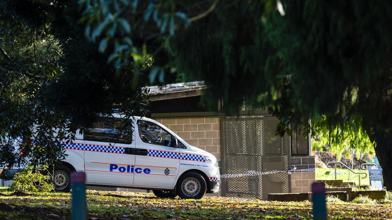 Police at a crime scene after a suspected arson of the toilet block in Lake Annand park, Wednesday, May 25, 2022. Picture: Kevin Farmer