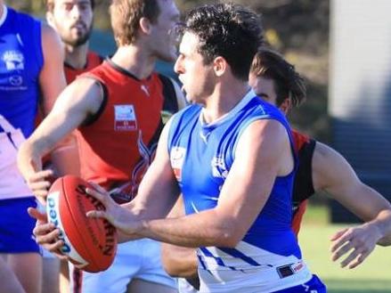 Leigh Osborne snaps one out of a pack for East Ringwood in the Eastern Football League (EFL). Picture: Field of View Sports Photography