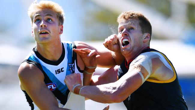 Billy Frampton of the Power rucks against Reilly O'Brien of the Crows on Saturday. Picture: AAP/Mark Brake