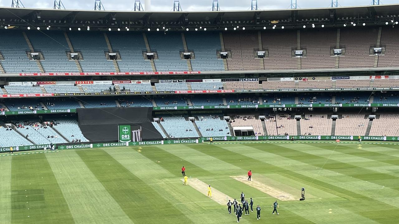 A small MCG crowd watches England take on Australia.