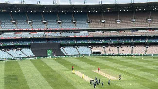 A small MCG crowd watches England take on Australia.