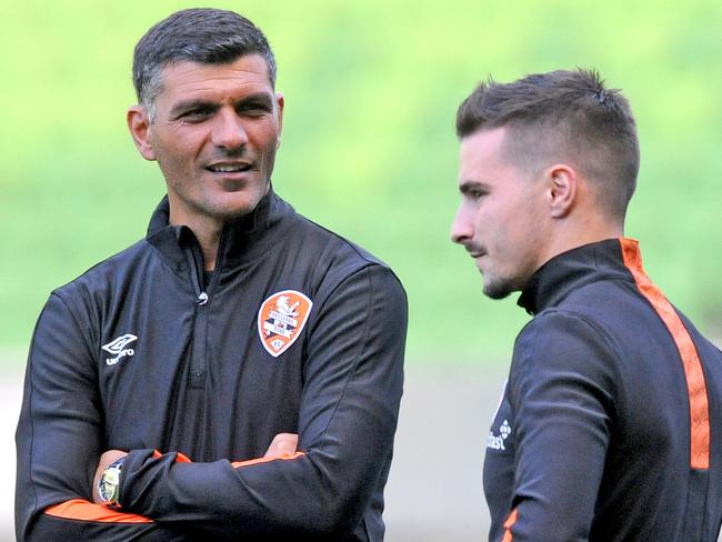 John Aloisi chats with Jamie Maclaren during the pair’s time at Brisbane Roar. Picture: AAP / Joe Castro