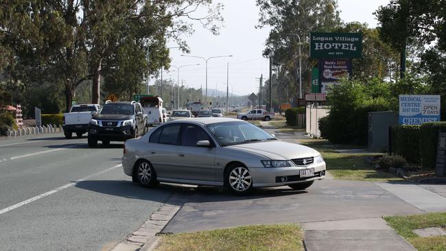 The main road at Logan Village where residents say a four-lane highway is going to ruin the quaint atmosphere. AAP Image/Jono Searle