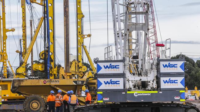 Piling rigs digging and building during early works on the West Gate Tunnel. Picture: Wayne Tay