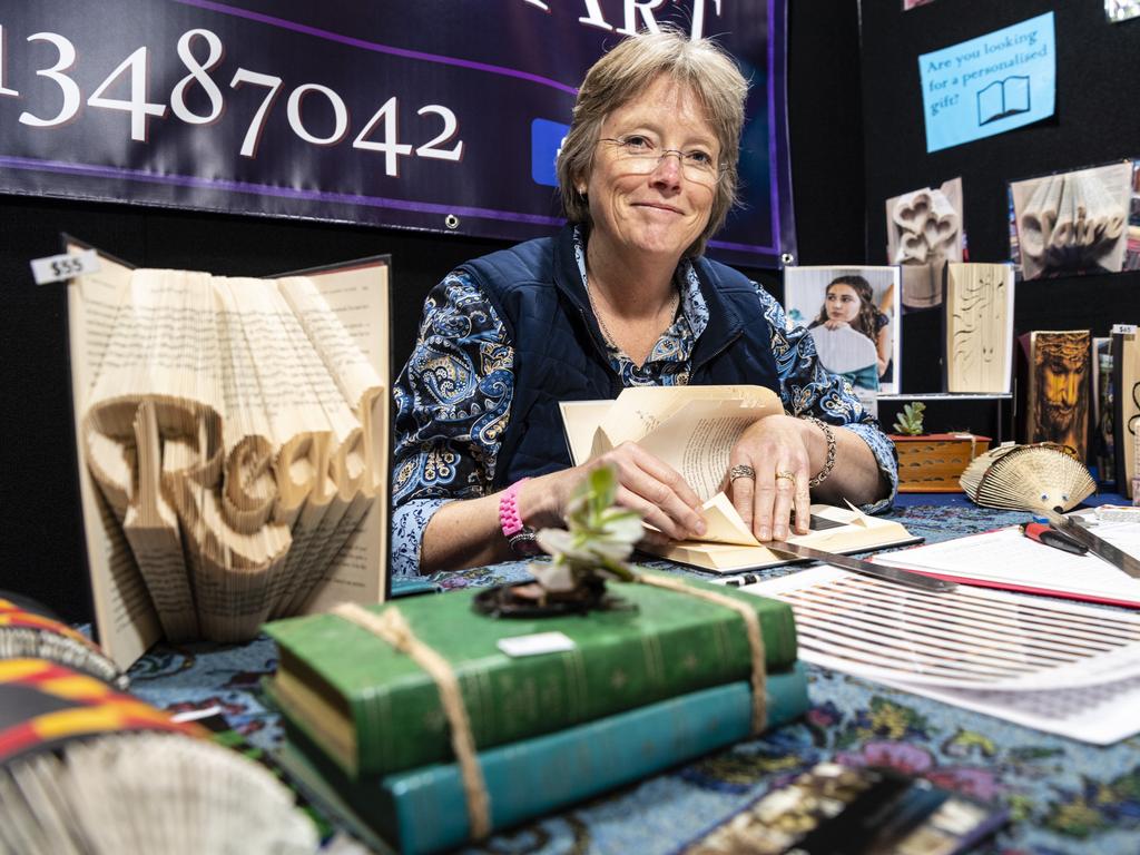 Kylie Meagher shows her work at her Kylie's Book Art stall at Craft Alive at the Goods Shed, Saturday, May 21, 2022. Picture: Kevin Farmer