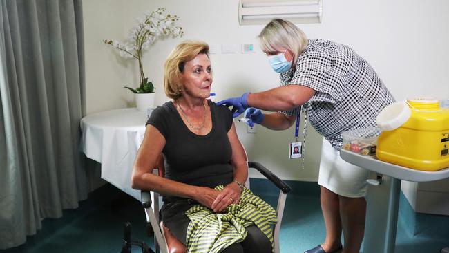 Doctor Helen McArdle AMA President AMA Tasmania with clinical nurse consultant Nikki Lane at the Roy Fagan Centre in Hobart. First Tasmanians to be given the AstraZeneca vaccination against COVID-19. Picture: Nikki Davis-Jones