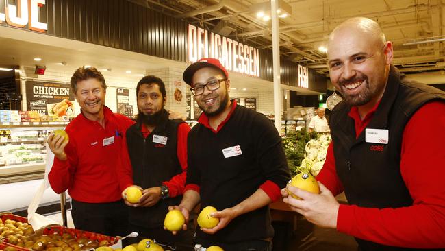 L to R: Store manager Zoran Mitrovski, team members Babu Uddin and Prayash Adhikari and Store support manager Vincenzo Serravalle in the refurbished Coles at Eastpoint, Bondi Junction. Picture: John Appleyard