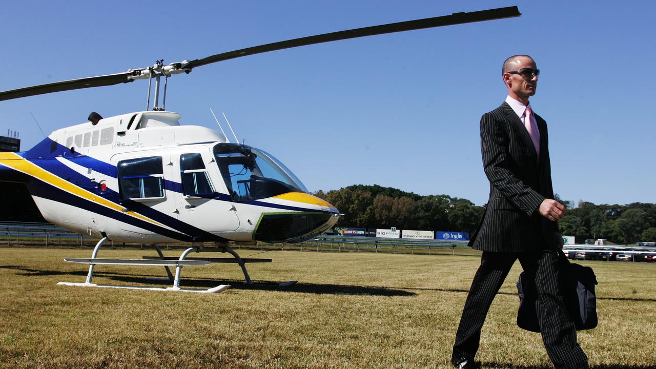Glen Boss arriving at Randwick Racecourse after flying a helicopter in 2006.