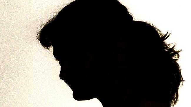 Silhouette of woman - mother fear domestic violence parent abuse.