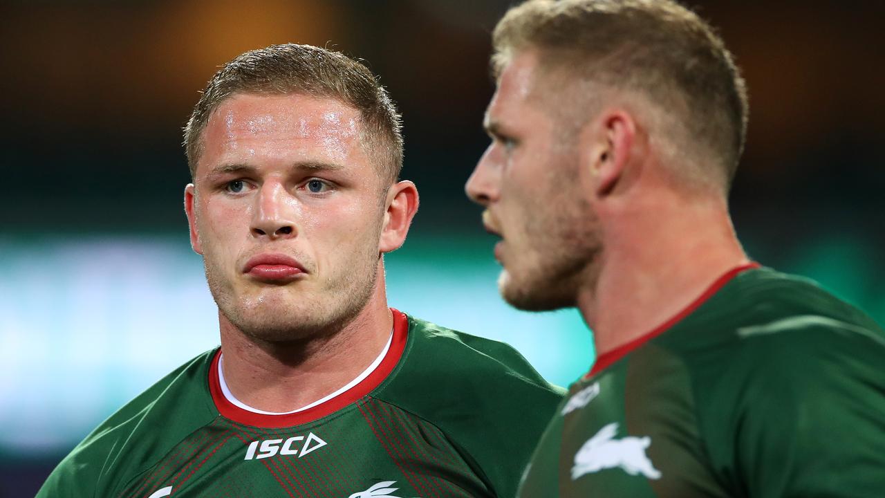 George Burgess (left) has been charged by police.