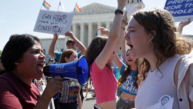 Abortion-rights protesters argue with an anti-abortion activists in front of the US Supreme Court in Washington. Picture: Getty Images