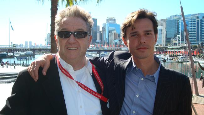 Former boss of Warner Music International Peter Ikin (L) with his lover Alex Despallieres in an undated photo at Darling Harbour in Sydney. Picture: Supplied