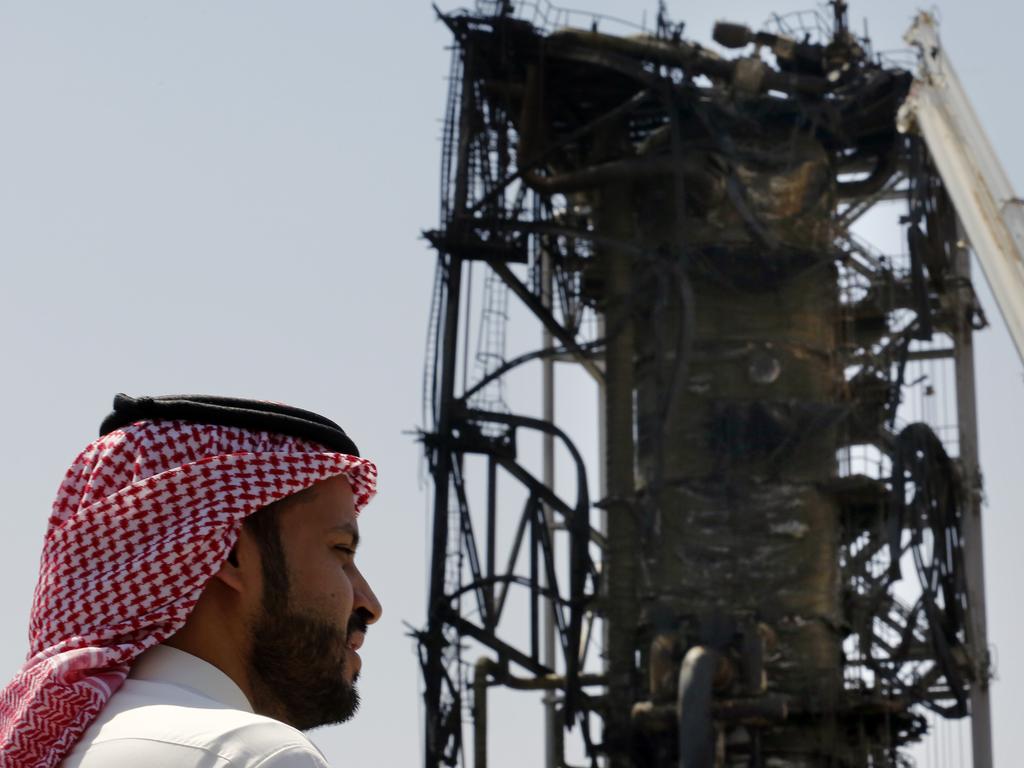 A man watches the damaged in the Aramco's Khurais oil field, Saudi Arabia. Picture: AP