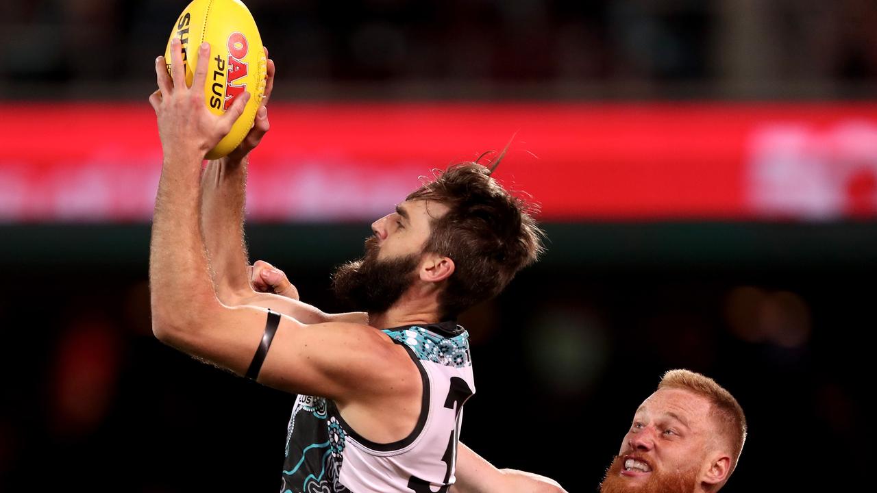 ADELAIDE, AUSTRALIA - JUNE 08: Justin Westhoff of the Power marks in front of Nick Vlastuin of the Tigers during the 2018 AFL round 12 match between the Port Adelaide Power and the Richmond Tigers at Adelaide Oval on June 08, 2018 in Adelaide, Australia. (Photo by James Elsby/AFL Media/Getty Images)