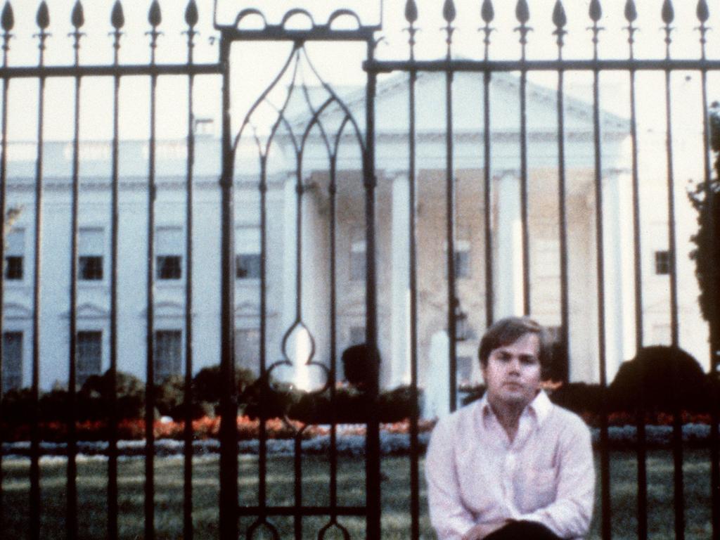 March 01, 1981: John Hinckley in front of the White House in Washington, DC. 