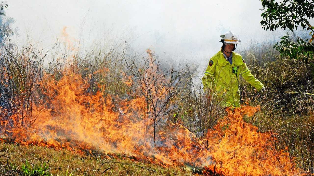 Queensland Fire and Rescue Services fire fighters from the Ripley Station were on hand to control a small grass fire at Yamanto. Photo: David Nielsen / The Queensland Times. Picture: David Nielsen