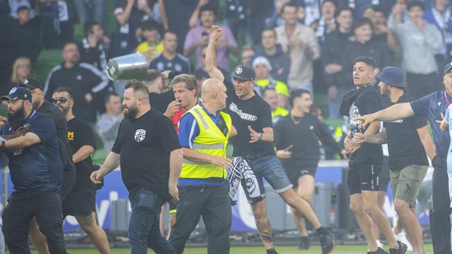 Melbourne Victory fans invade the pitch during December’s derby at AAMI Park. Picture: AAP Image/Will Murray