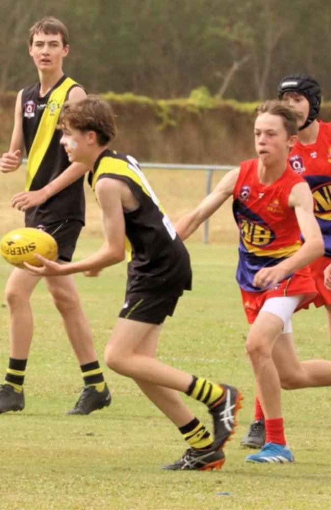 Northern beaches Suns rising star Logan Pedersen attempts to make a tackle. Picture: John Zohn.