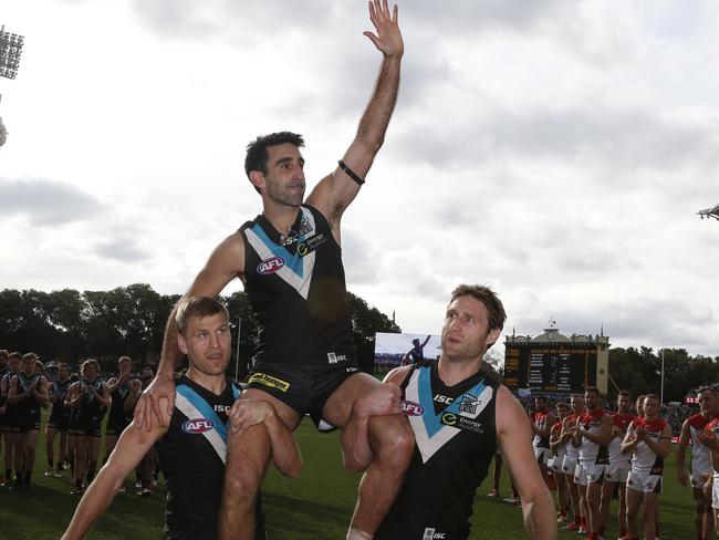 Dom Cassisi chaired off after his final game. Picture: Sarah Reed