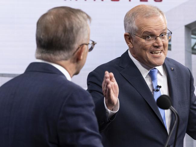 Scott Morrison points at his opponent. Picture: Alex Ellinghausen/Getty Images