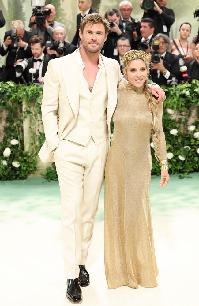 Chris Hemsworth and Elsa Pataky dressed in gold attend the Met Gala. Picture: Getty Images