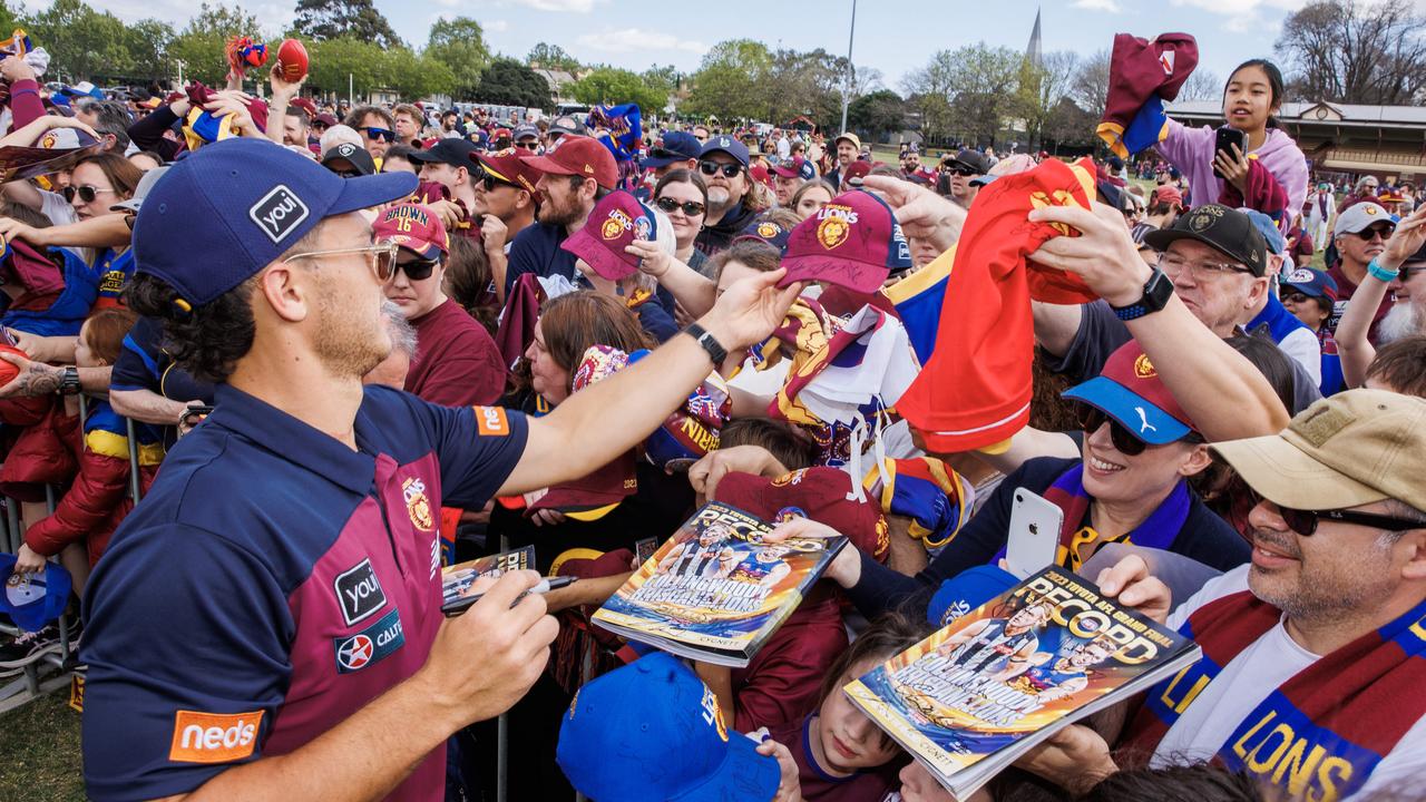 Cam Rayner signing autographs. Picture: Lachie Millard