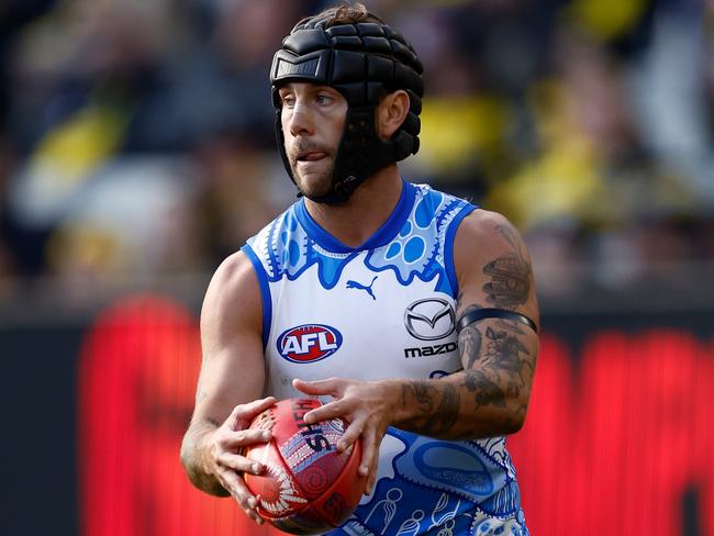 MELBOURNE, AUSTRALIA - MAY 18: Caleb Daniel of the Kangaroos in action during the 2025 AFL Round 10 match between the Richmond Tigers and the North Melbourne Kangaroos at the Melbourne Cricket Ground on May 18, 2025 in Melbourne, Australia. (Photo by Michael Willson/AFL Photos via Getty Images)