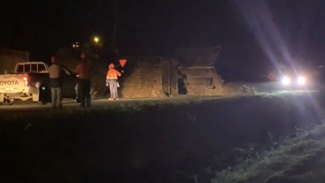 A locomotive crashed into sugar cane bins