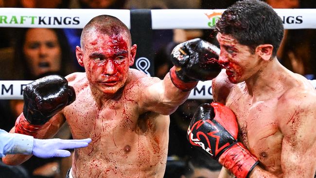 LAS VEGAS, NV - MARCH 30: (EDITORS NOTE: Image depicts graphic content) Tim Tszyu (in gold & black short) and Sebastian Fundora (in red & black short) exchange punches during their super welterweight world titles of the Premiere Boxing Championship on Saturday night as Sebastian Fundora wins at the T-Mobile Arena in Las Vegas, Nevada, United States on March 30, 2024. (Photo by Tayfun Coskun/Anadolu via Getty Images)