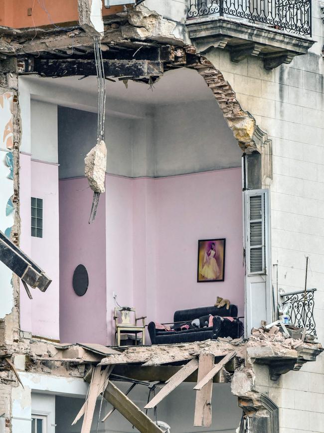 A house damaged by the huge blast that wrecked the neighbouring Hotel Saratoga.