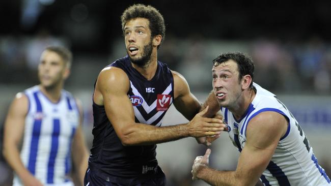 Fremantle Dockers ruckman Zac Clarke takes on North Melbourne’s Todd Goldstein.