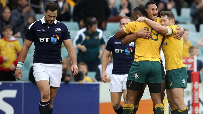 Israel Folau leaves the Scots momentarily dejected.