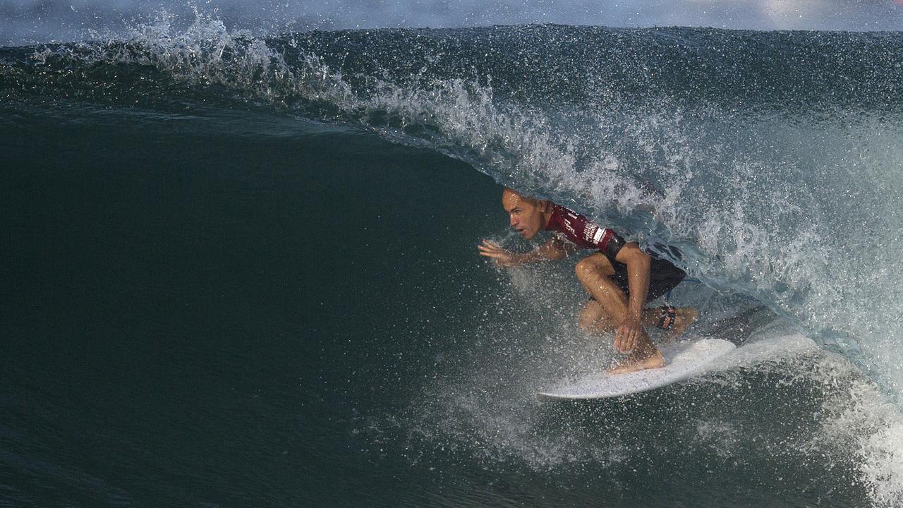 FILE - In this May 12, 2015 file photo, U.S. surfer Kelly Slater competes in the 2015 Oi Rio Pro World Surf League competition at Barra da Tijuca beach in Rio de Janeiro, Brazil. (AP Photo/Leo Correa, File)